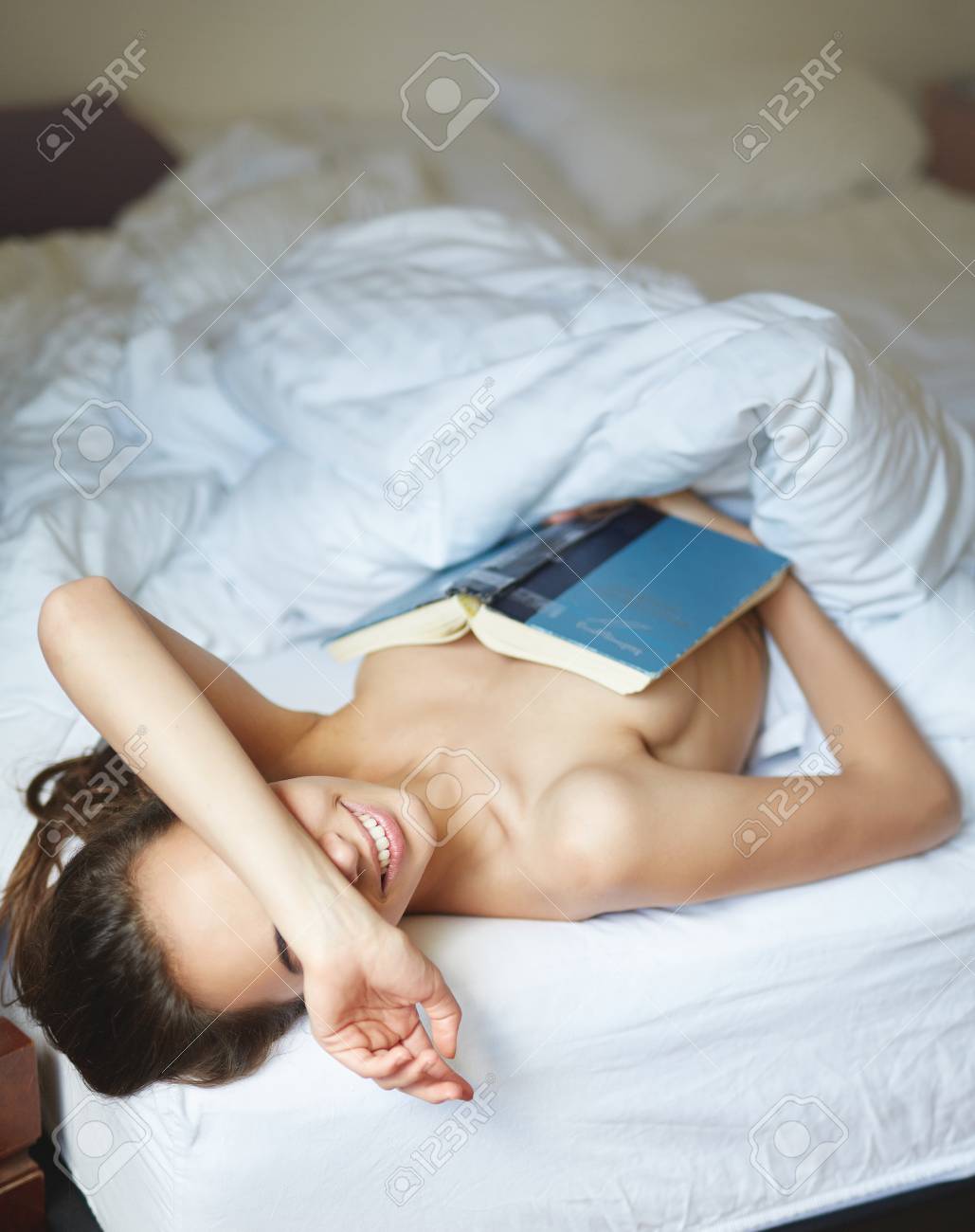 naked wife under covers