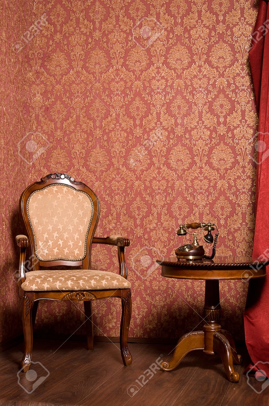 Interior In Retro Style Against A Background Of Vintage Wallpaper