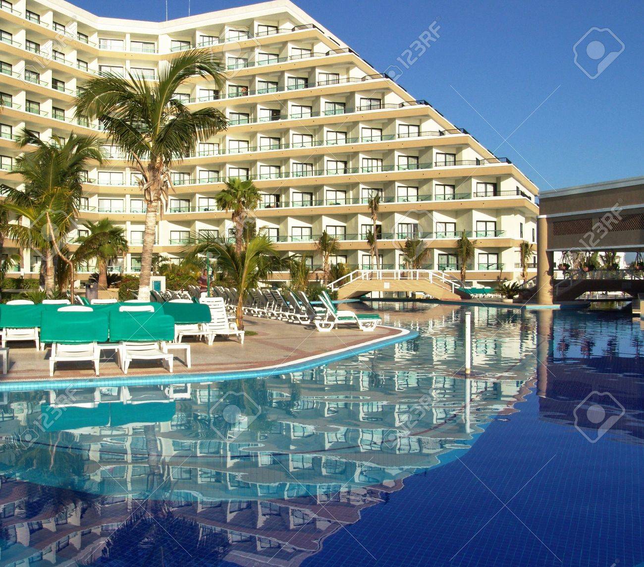 luxury resort hotel with swimming pool, cancun, mexico. stock luxury resort hotel with swimming pool, cancun, mexico. stock