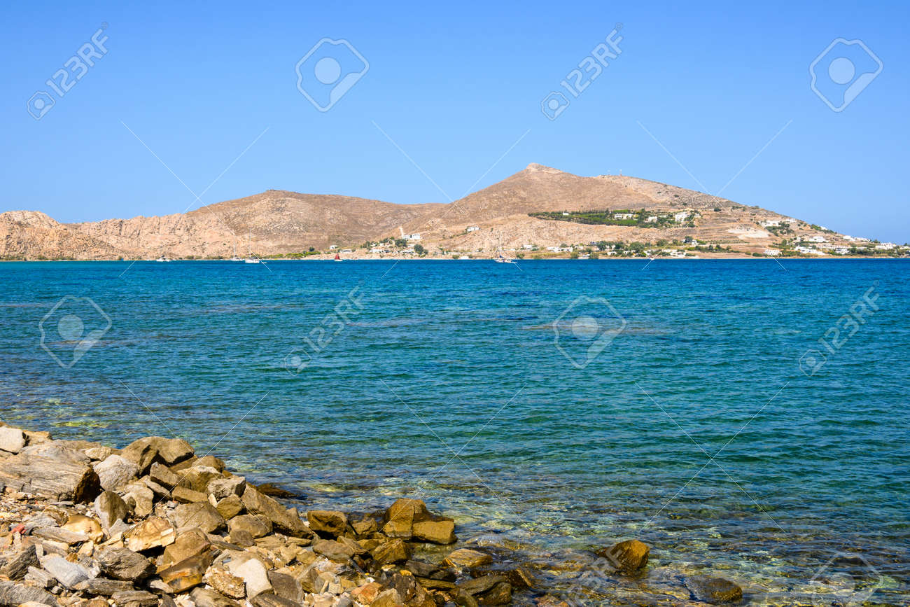 Beautiful bay with blue crystal waters. Paros island, Greece - 169388179 Beautiful bay with blue crystal waters. Paros island, Greece - 169388179