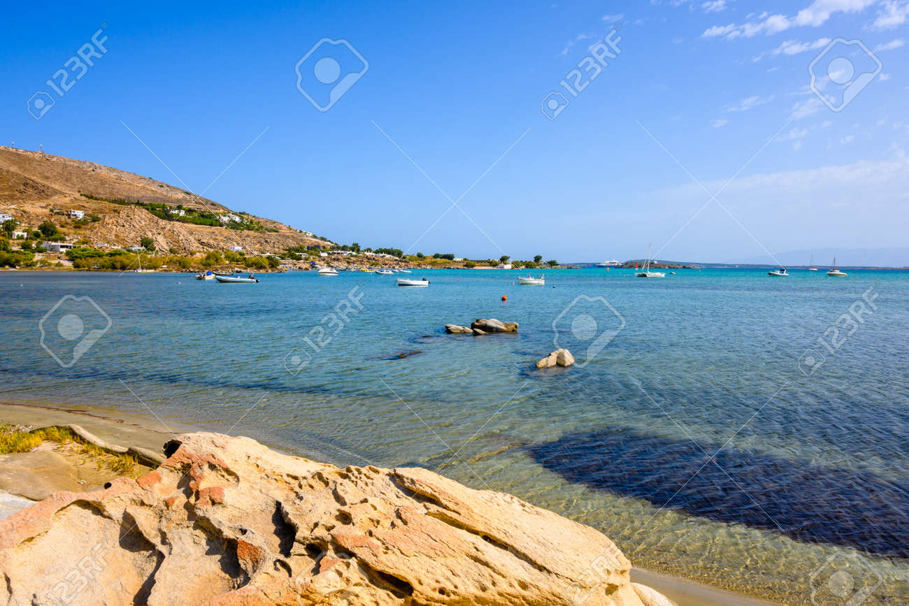 Beautiful bay with blue crystal waters. Paros island, Greece - 169388184 Beautiful bay with blue crystal waters. Paros island, Greece - 169388184