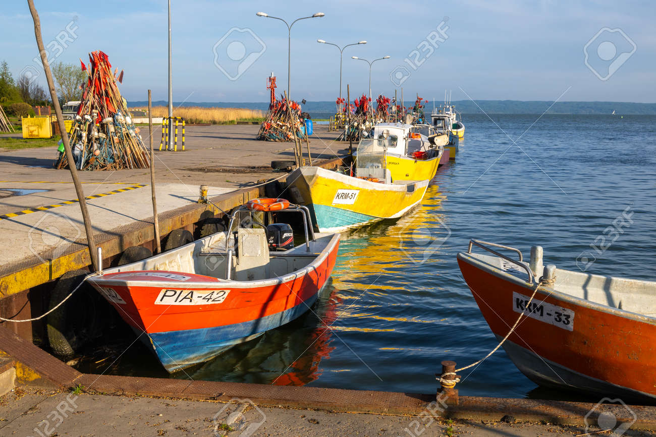 Krynica Morska, Poland - May 15, 2021: Fishing port of Krynica Morska situated on Vistula Spit between the waters of the Gulf of Gdańsk. Poland - 169381691 Krynica Morska, Poland - May 15, 2021: Fishing port of Krynica Morska situated on Vistula Spit between the waters of the Gulf of Gdańsk. Poland - 169381691