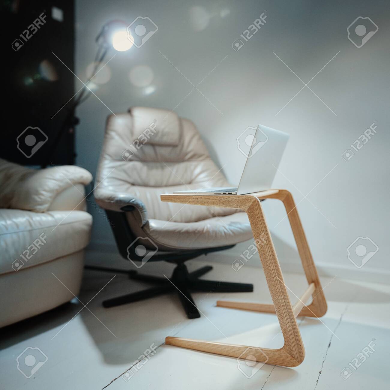Wood Minimalistic Coffee Table With Laptop In White Interior Stock Photo Picture And Royalty Free Image Image 125475414