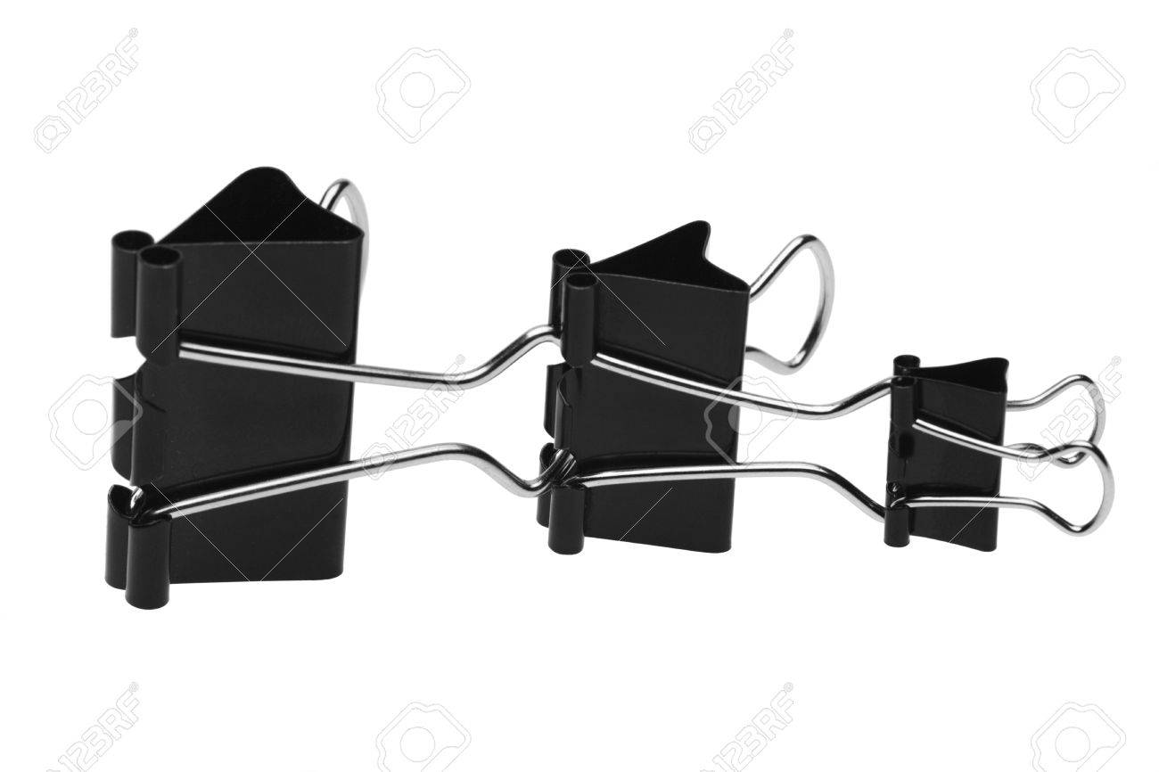 composition of three black clips for paper clip attachment isolated