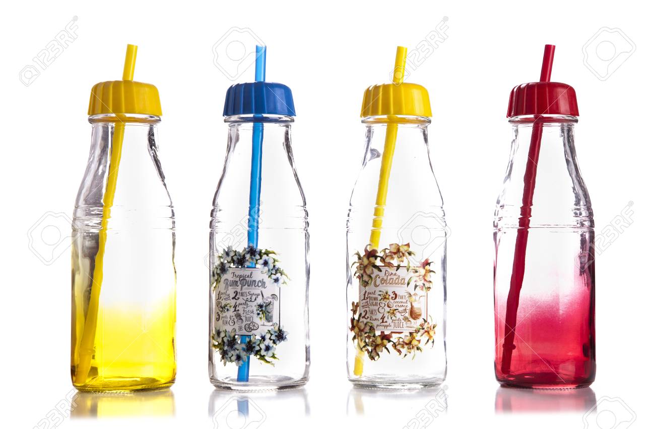 empty colored glass bottles with a lid and a straw on white backgroundjuice bottles - Colored Glass Bottles empty colored glass bottles with a lid and a straw on white backgroundjuice bottles - Colored Glass Bottles