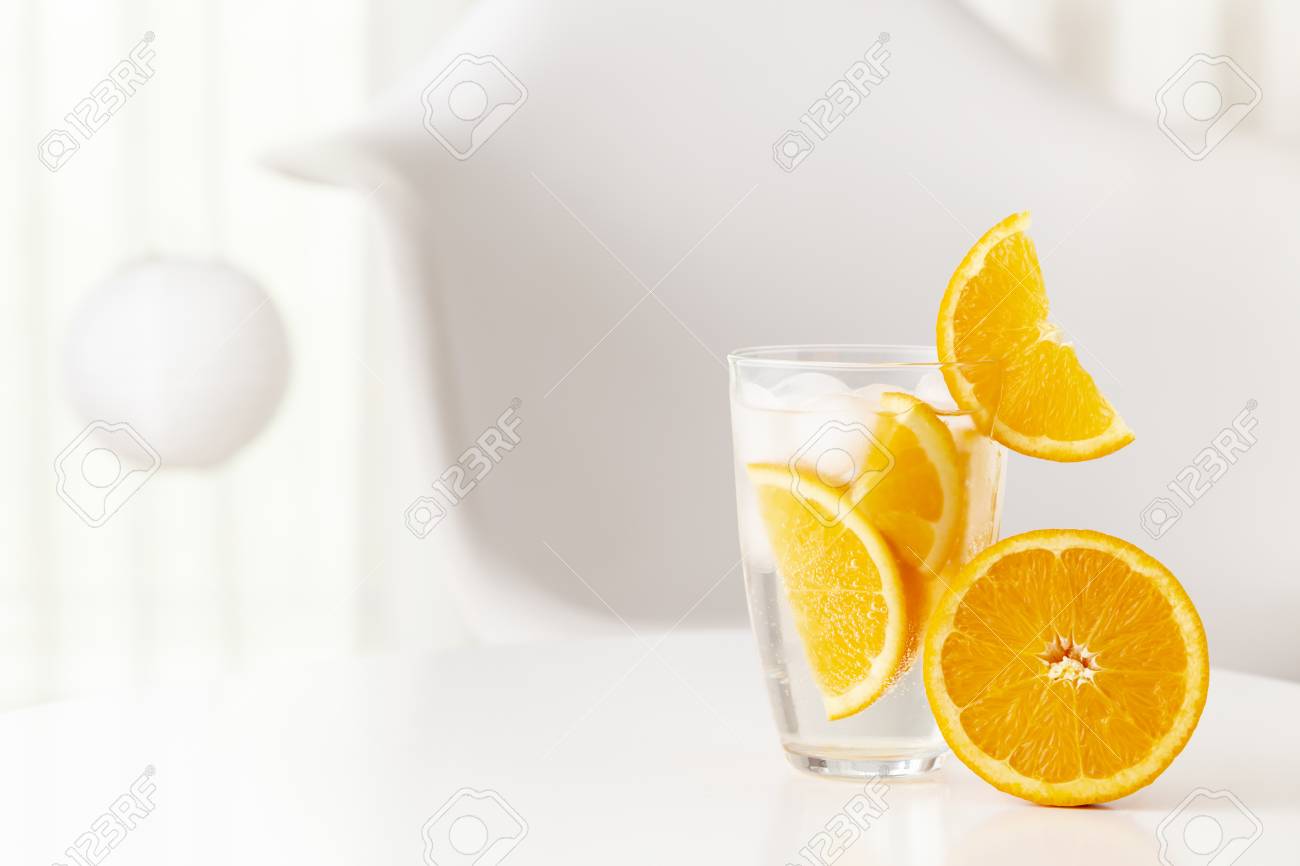 Glass Of Fresh Cold Infused Water With Orange Slices And Ice Stock Photo Picture And Royalty Free Image Image 102272576