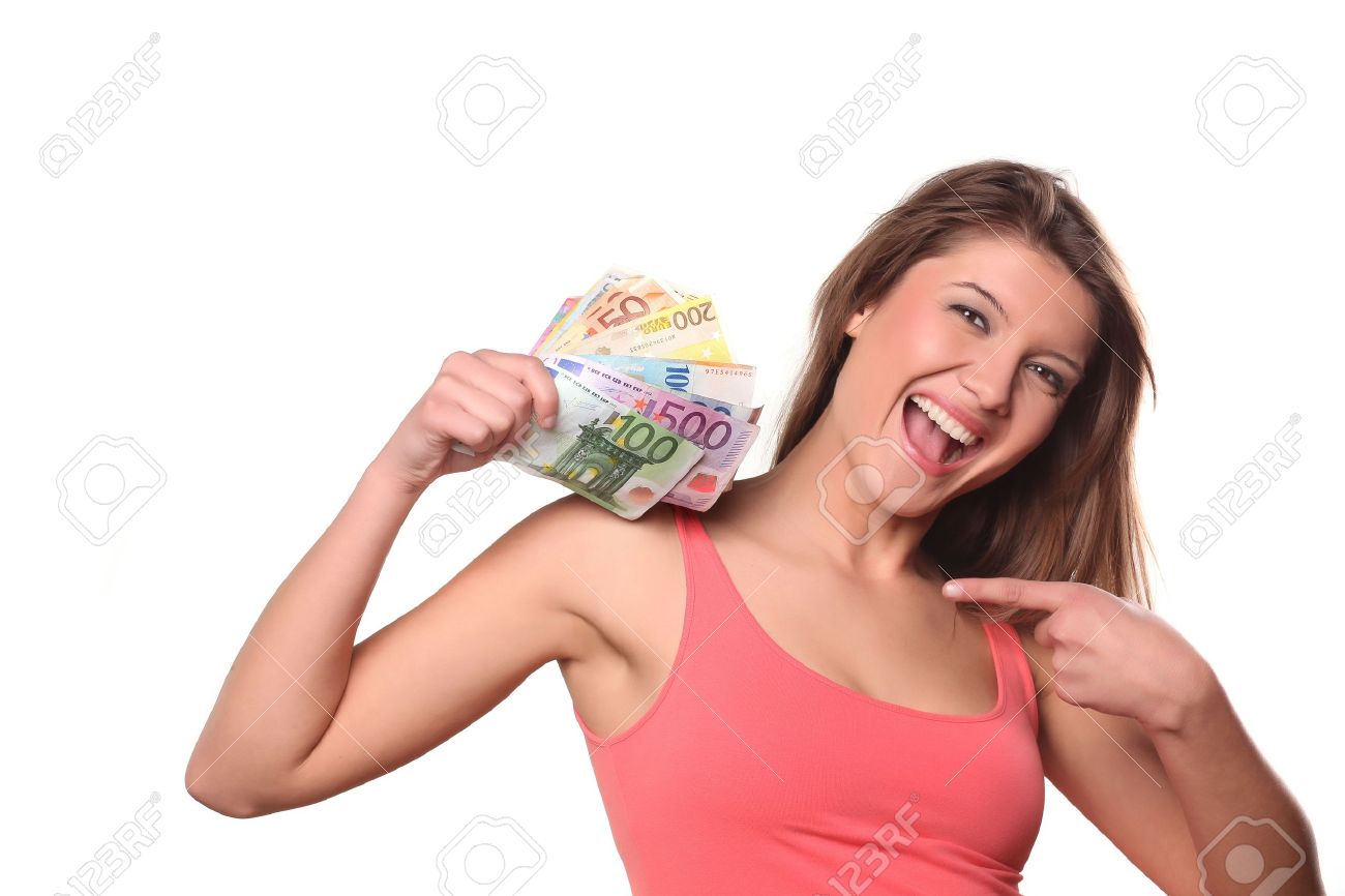 Girl With Money With A Happy Face On A White Background Stock Photo, Picture And Royalty Free Image. Image 18064097.