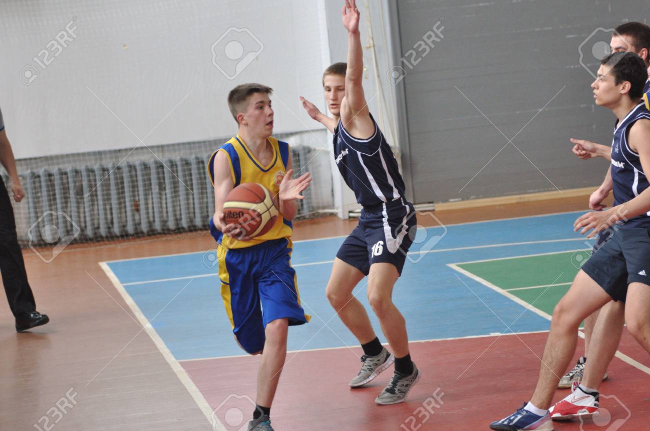 Orenburg, Russia - 15 May 2015: Boys play basketball for the Cup High School Basketball League - 72821226 Orenburg, Russia - 15 May 2015: Boys play basketball for the Cup High School Basketball League - 72821226