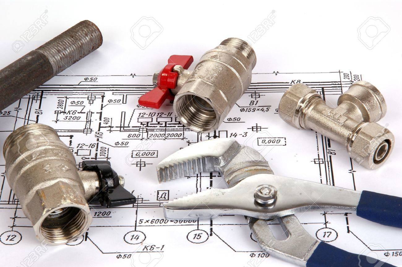 Plumbing Parts And Tools For Drawing Closeup Stock Photo Plumbing Parts And Tools For Drawing Closeup Stock Photo