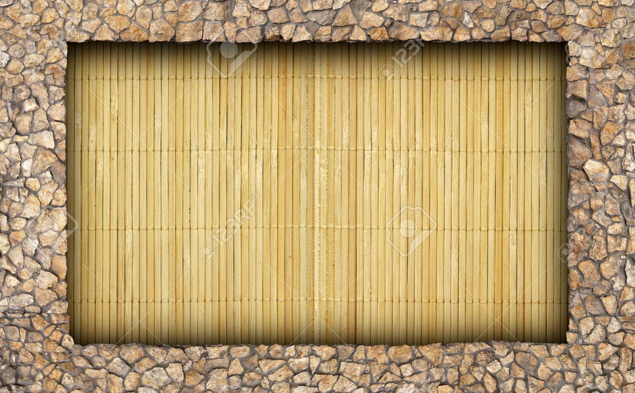 Estera De Bambu En La Pared De La Piedra Natural Como Fondo Fotos