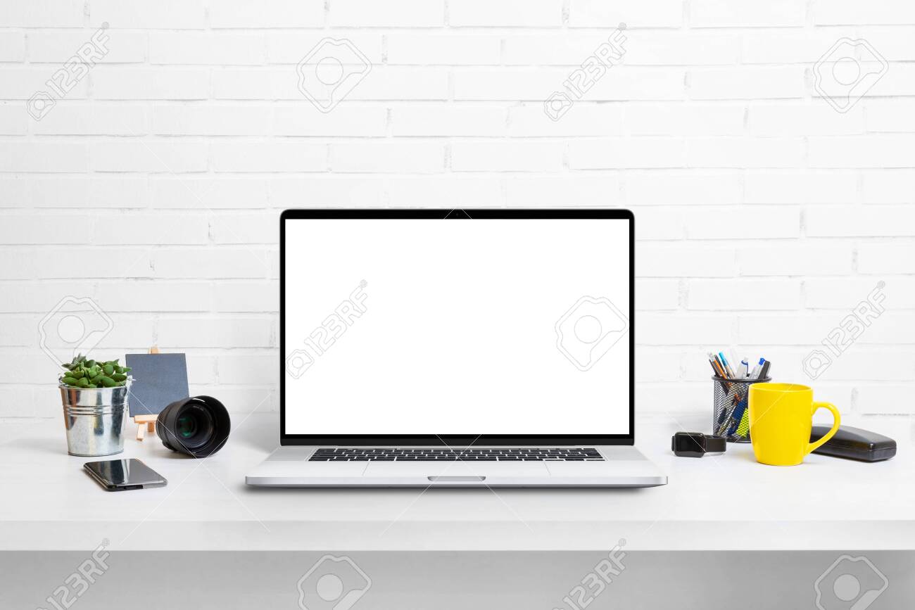 Download Computer Display Mockup On Work Desk White Work Desk With Plants Stock Photo Picture And Royalty Free Image Image 152609307 PSD Mockup Templates