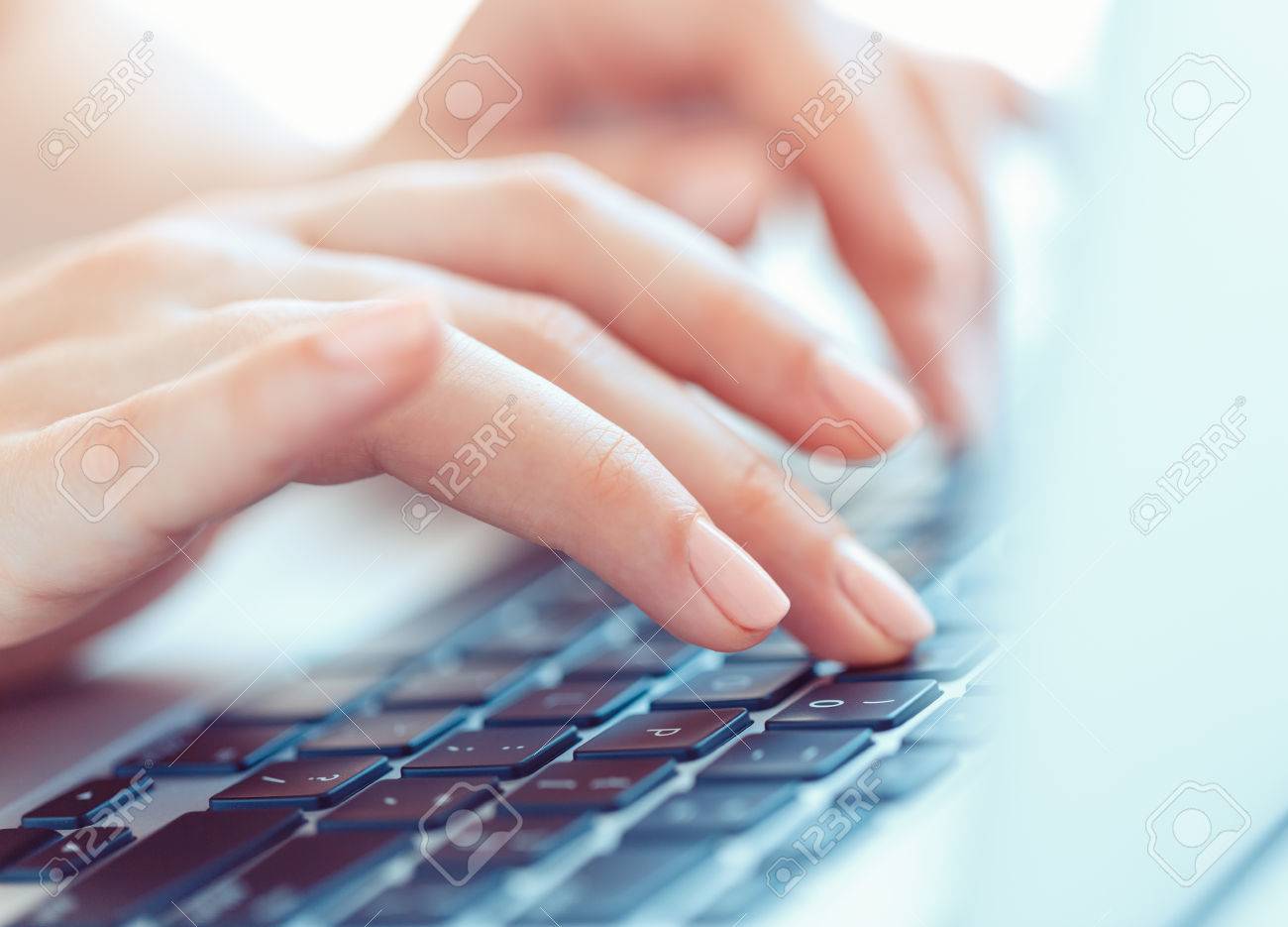 Female hands or woman office worker typing on the keyboard - 41087580 Female hands or woman office worker typing on the keyboard - 41087580