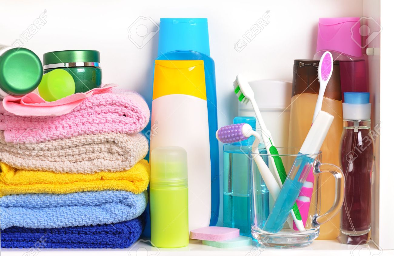 9501575-white-bathroom-shelf-with-cosmetics-and-toiletries-Stock-Photo.jpg