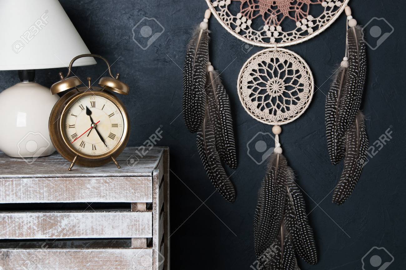 Beige Brown Dream Catcher Alarm Clock And Table Lamp In Bedroom