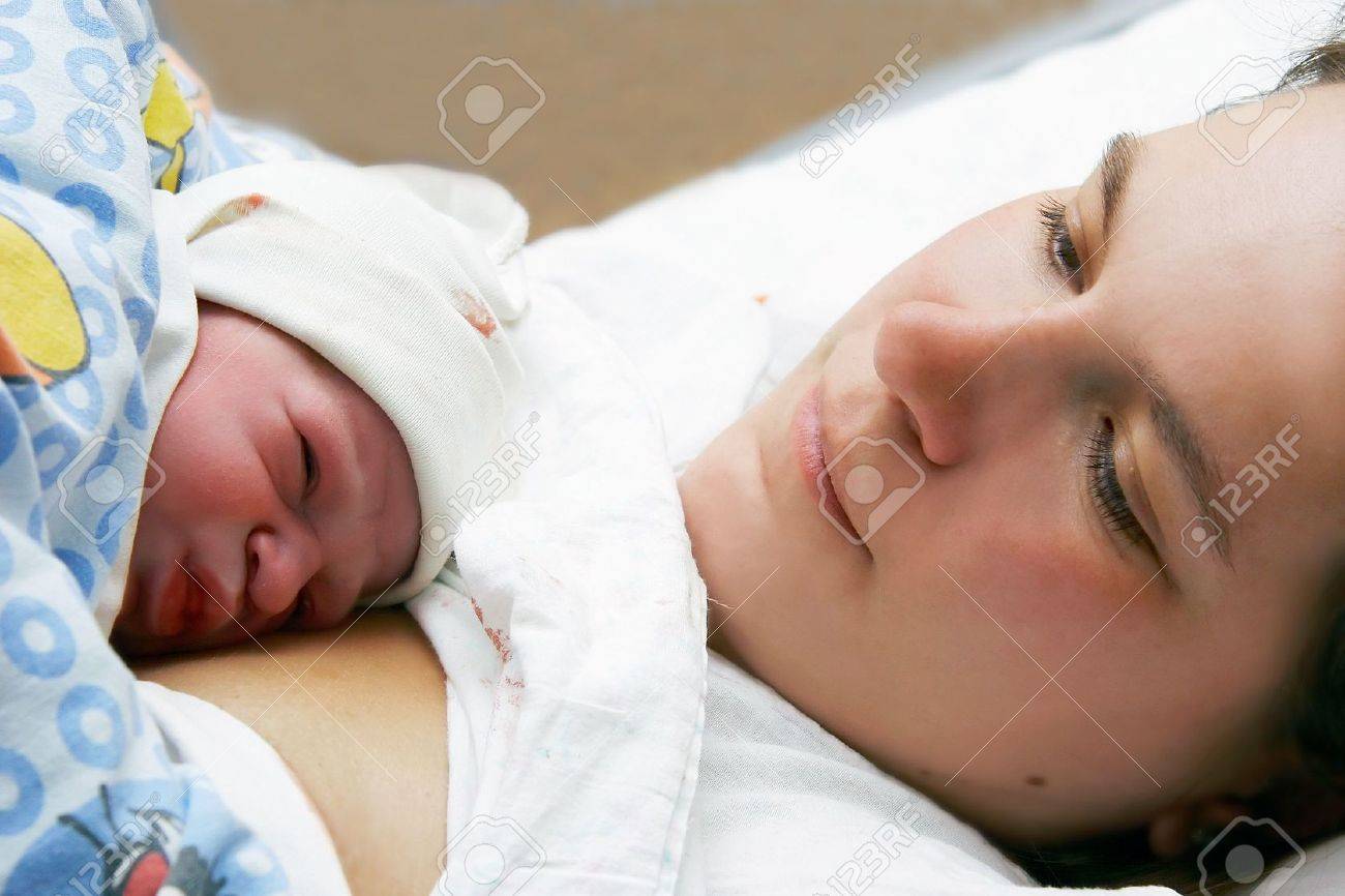 Portrait of mother and just born baby stock photo 4044110
