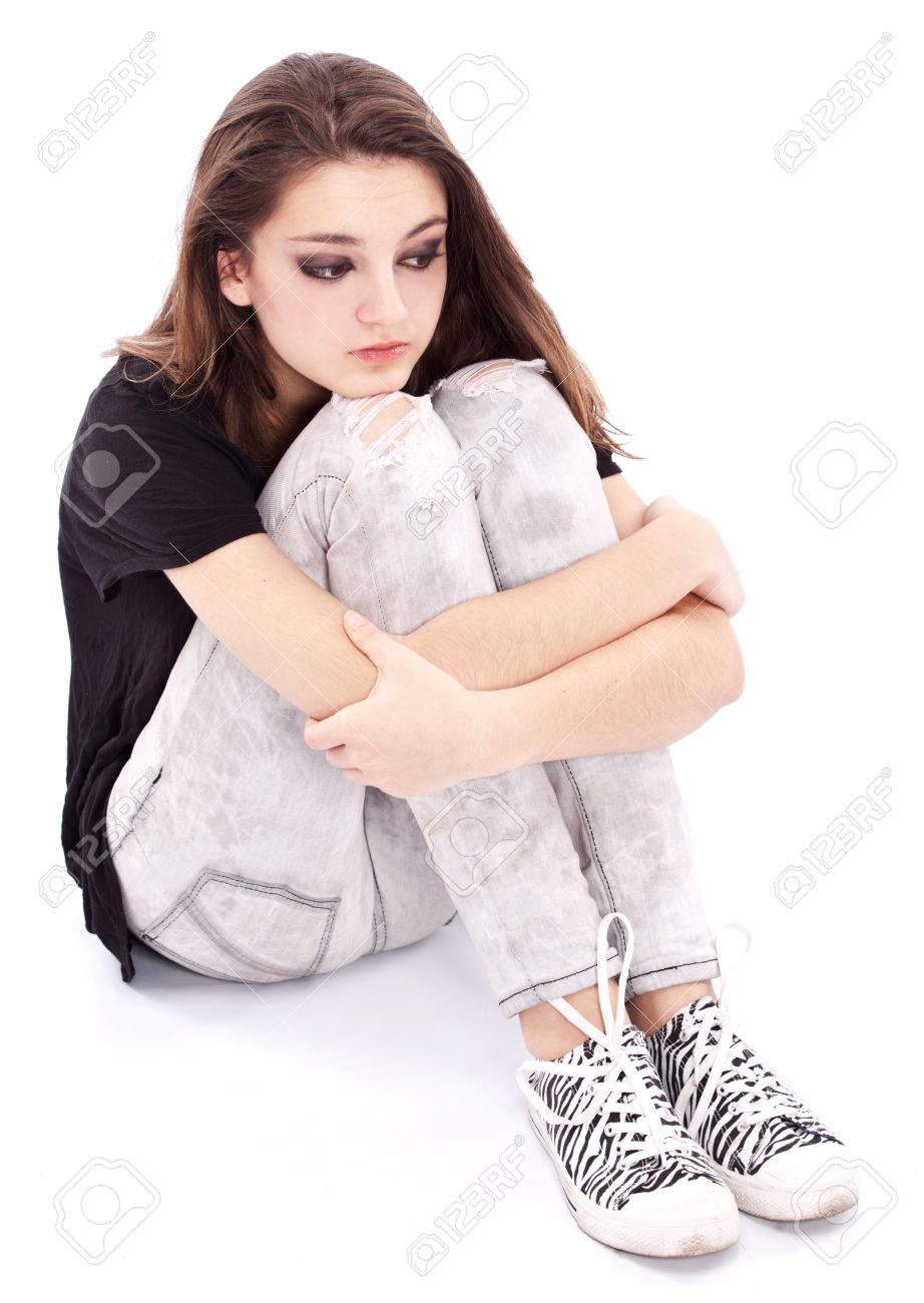 Sad Girl Teenager Sits Twining Arms About Legs. Isolated On A White  Background. Stock Photo, Picture and Royalty Free Image. Image 9074170., image size:922x1300