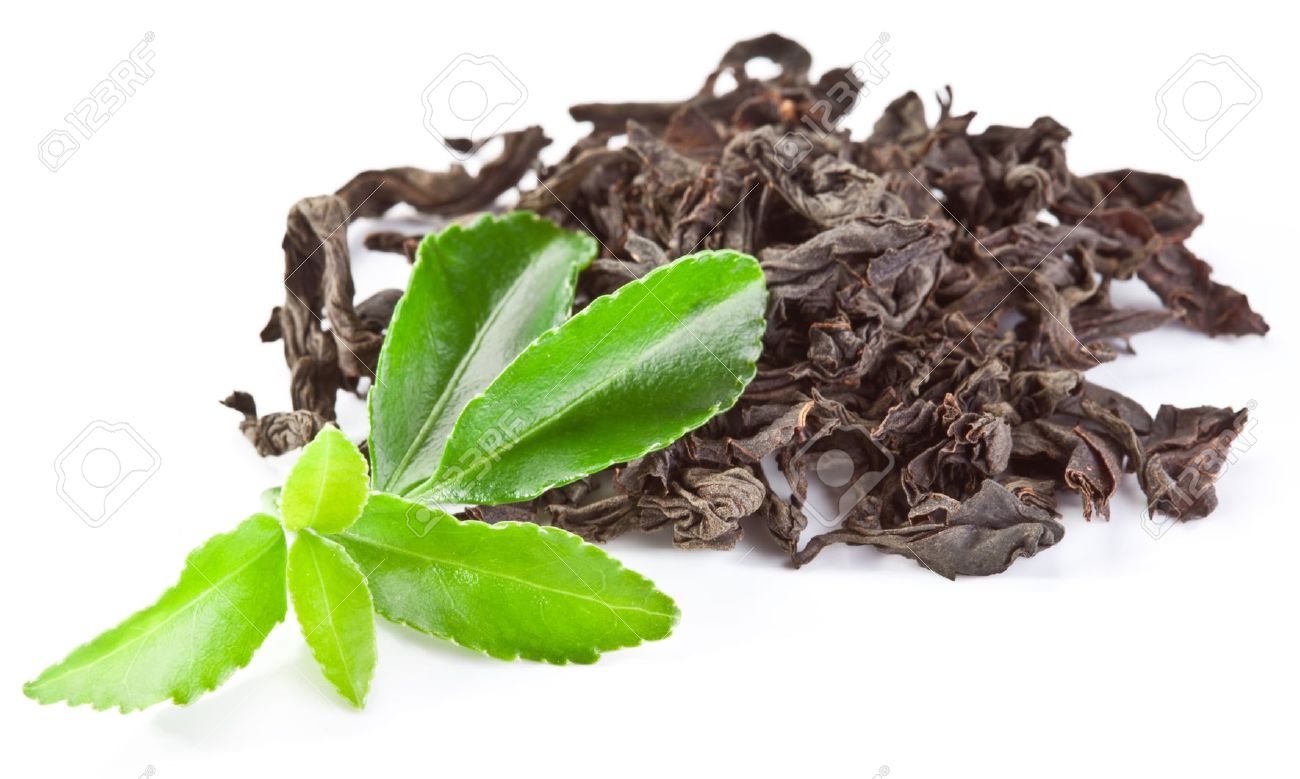 Heap Of Dry Tea With Green Tea Leaves Isolated On A White Background Stock Photo Picture And Royalty Free Image Image 10613032