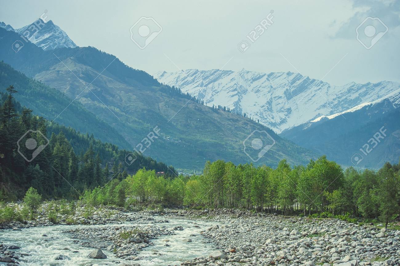 In The Front Beas River On A Background Himalayan Snow Mountains And White Clouds Stock Photo Picture And Royalty Free Image Image