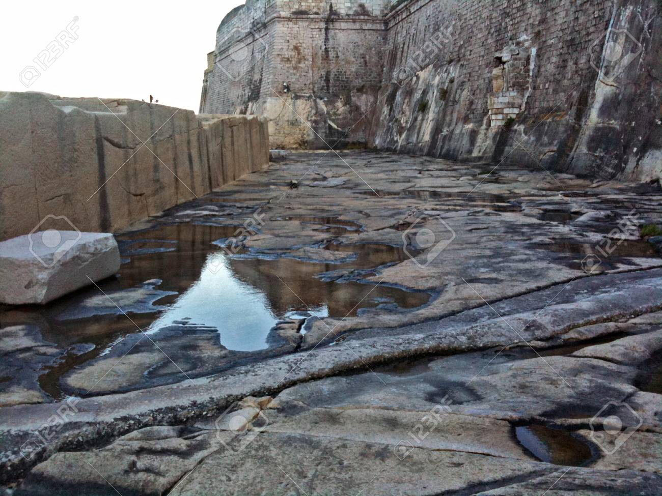 The beaten down lower section of a sea fort in Malta - 34370939 The beaten down lower section of a sea fort in Malta - 34370939