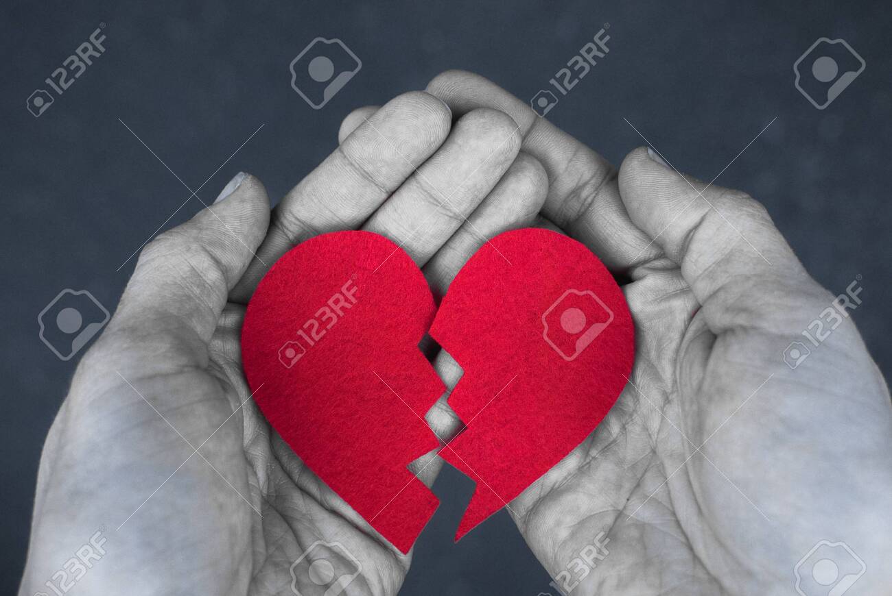 Broken Heart In The Hands - Divorce Concept. Monochrome Photo With Red Heart.  Blak And White Фотография, картинки, изображения и сток-фотография без  роялти. Image 120717241
