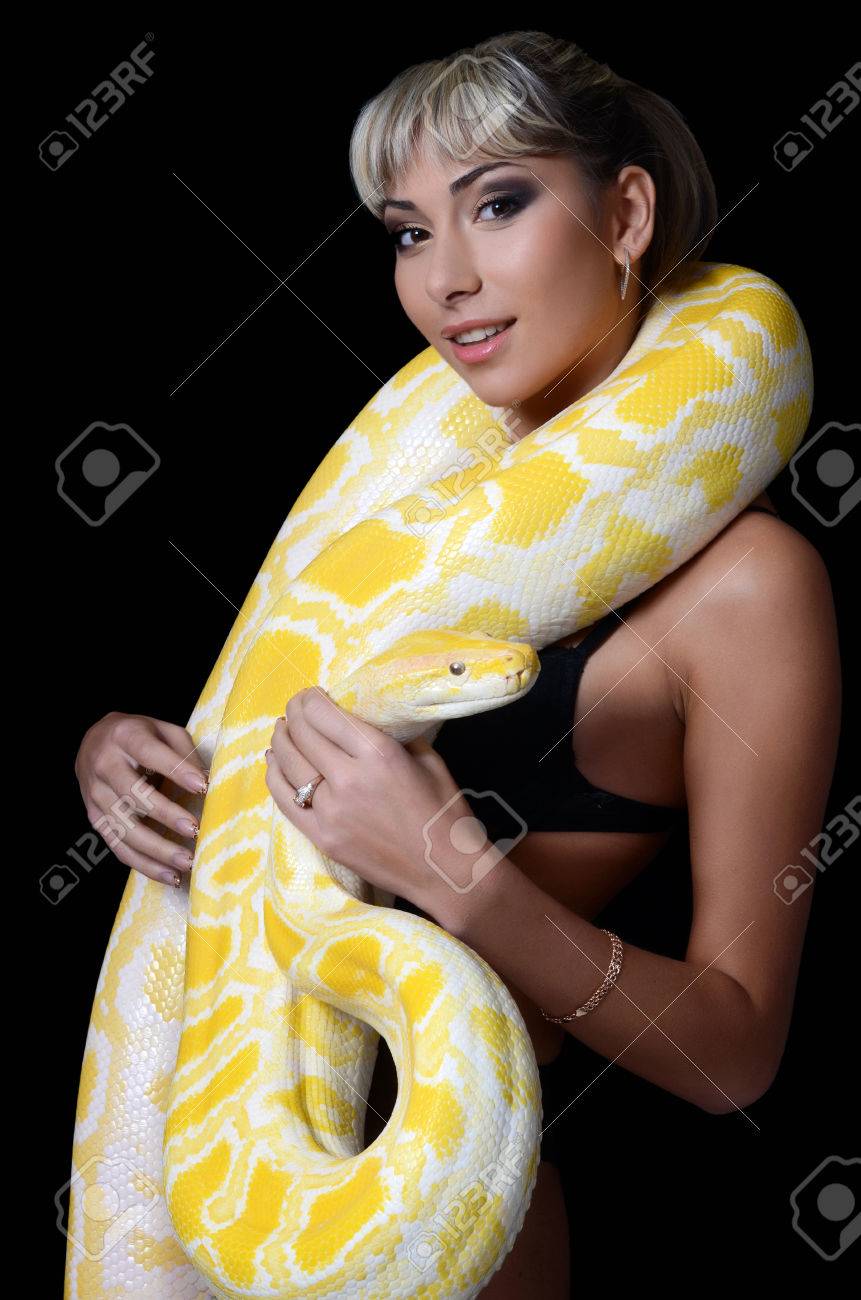 The Beautiful Woman With Big Yellow Snake Stock Photo Picture And Royalty Free Image Image 57711343
