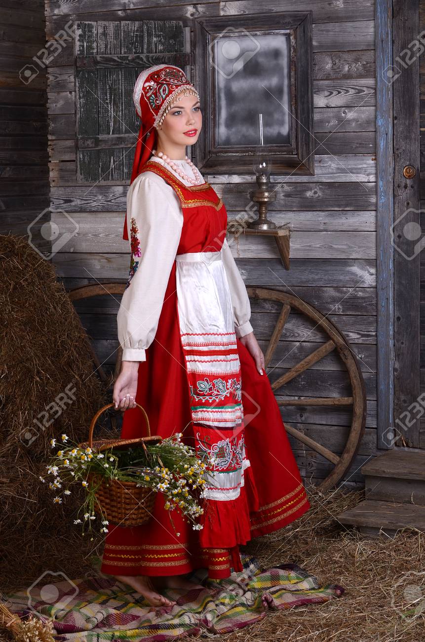Beautiful Woman Portrait In Russian Style. Beautiful Russian Girl In  Traditional Dress. Russian Style. Stock Photo, Picture and Royalty Free  Image. Image 105670991.