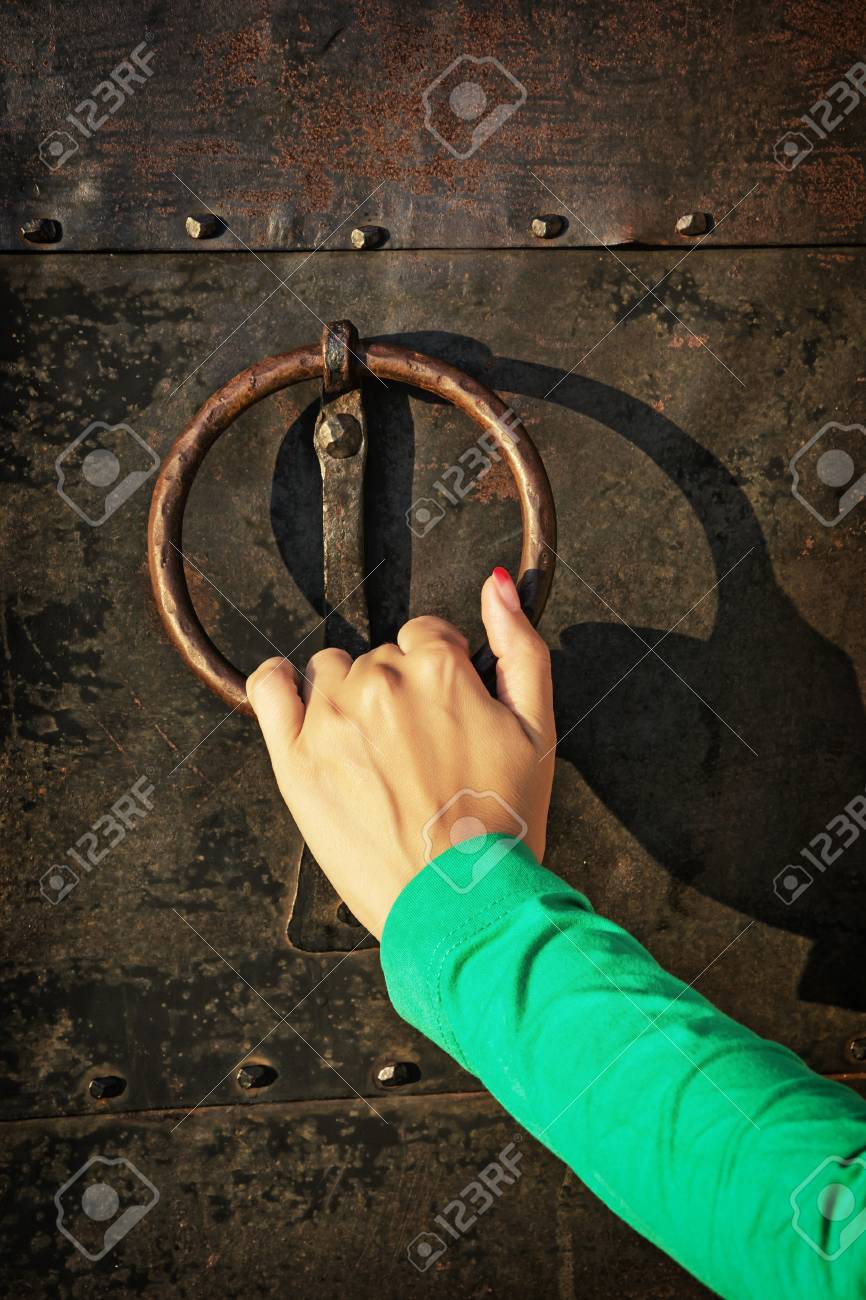 Vintage knocker door with woman's hand. - 46745107 Vintage knocker door with woman's hand. - 46745107
