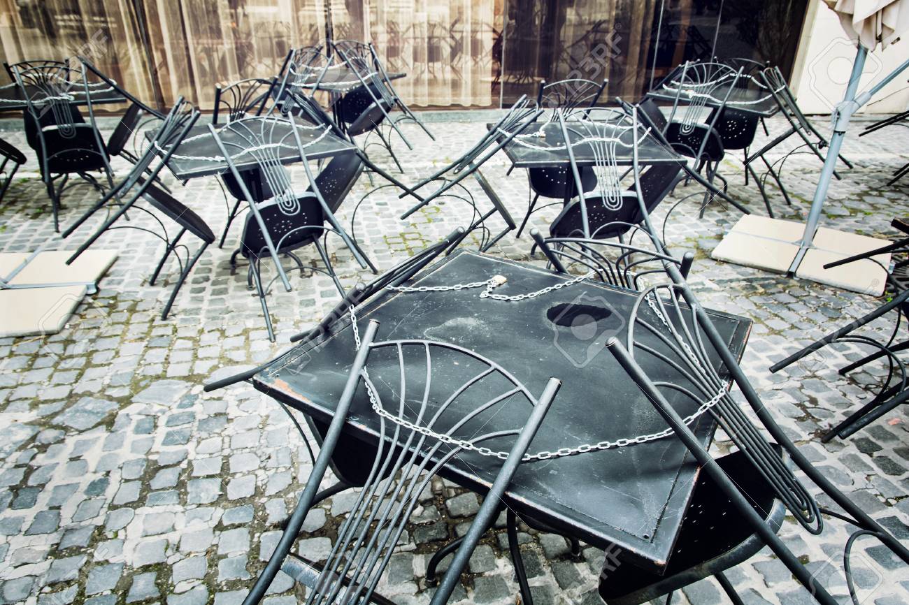 Set of metal garden chairs and tables in restaurant. It is closed. Outdoor street scene. - 48376780 Set of metal garden chairs and tables in restaurant. It is closed. Outdoor street scene. - 48376780