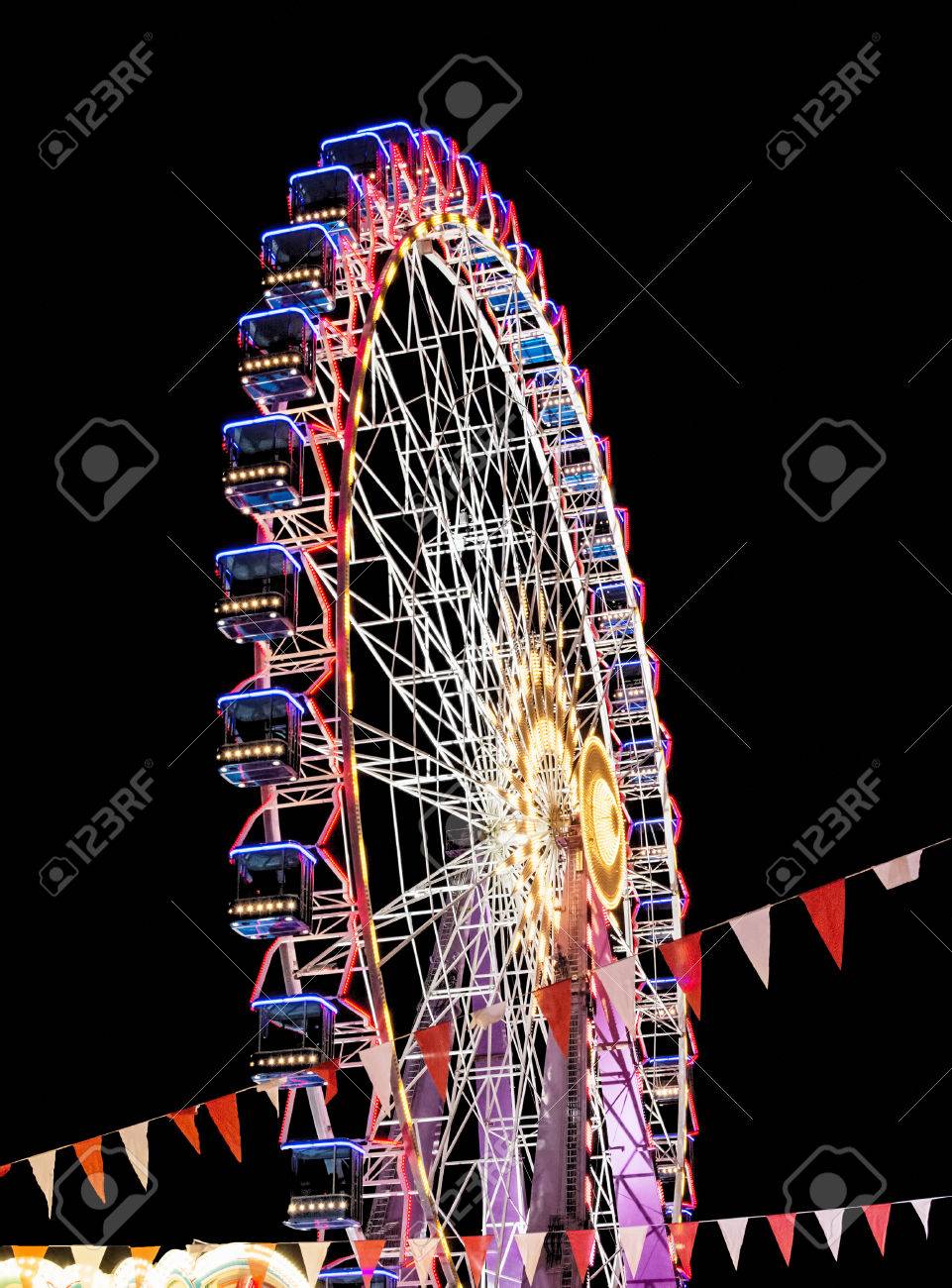 Modern Ferris Wheel In The Night. Free Time Activities. Stock Photo,  Picture and Royalty Free Image. Image 55458317., image size:961x1300