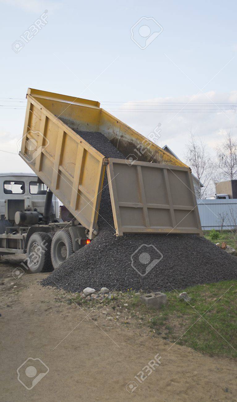 A Dump Truck Dropping Off A Load Stock Photo Picture And Royalty Free Image Image 13774380