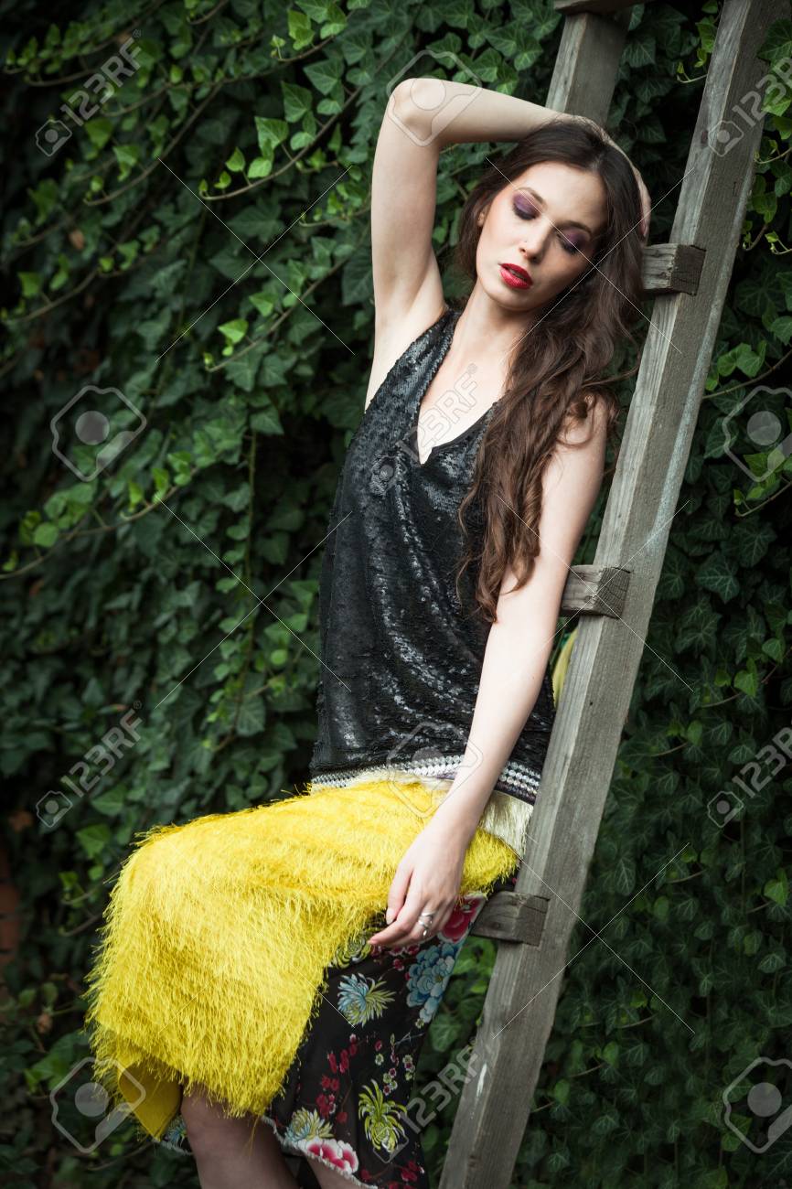 yellow skirt and black top