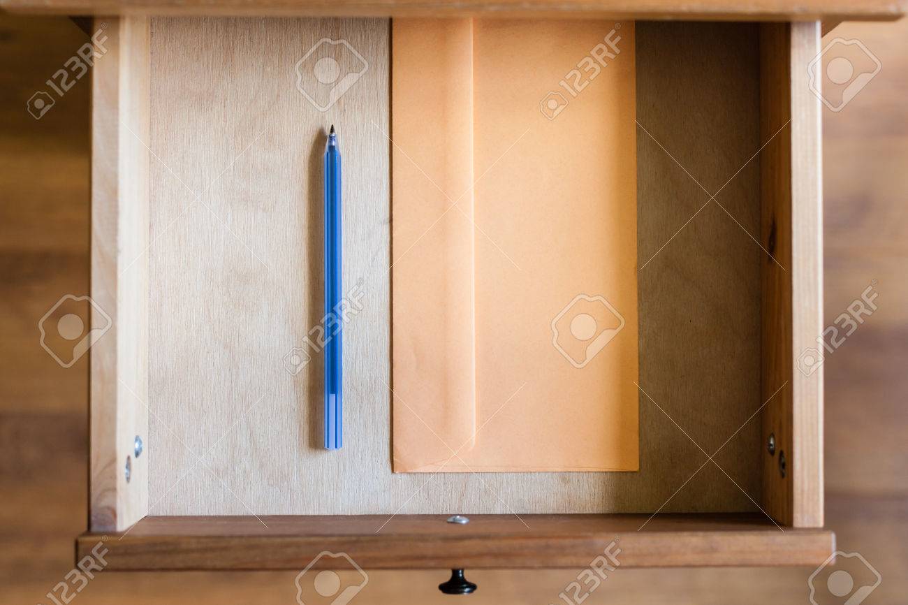 Above View Of Plastic Pen And Envelope In Open Drawer Of Nightstand Stock Photo Picture And Royalty Free Image Image 61487854