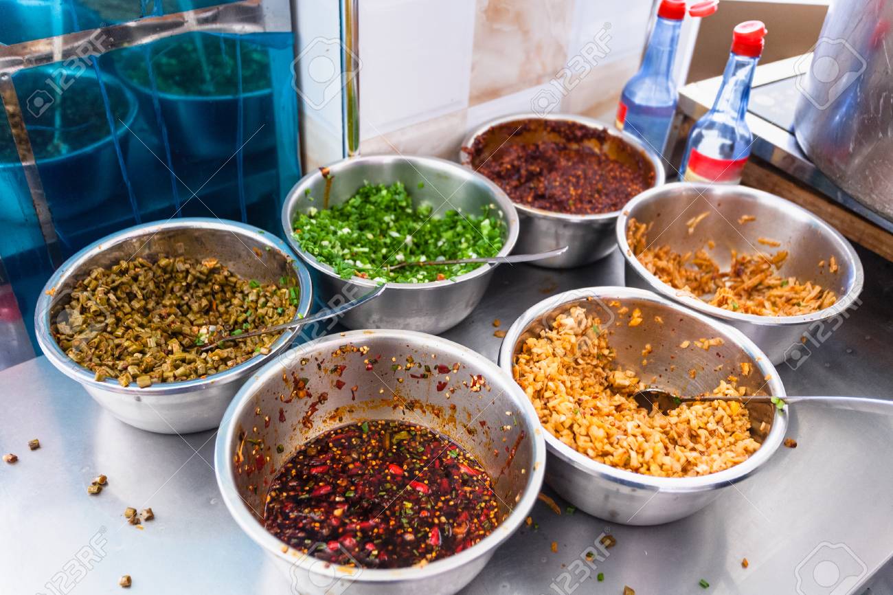 Travel To China Dishes With Seasonings Spices And Toppings