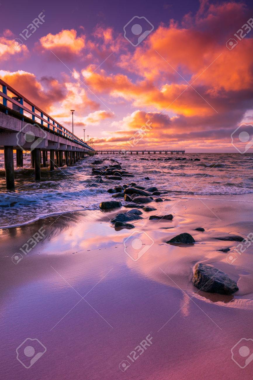 Pier And Sea At Pink Sunset Stock Photo Picture And Royalty Free Image Image
