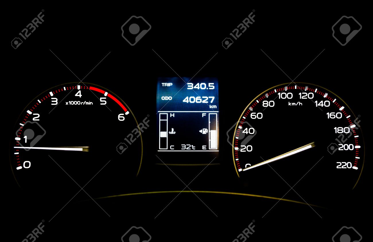 speedometer in car with lcd display of odometer and trip calculator