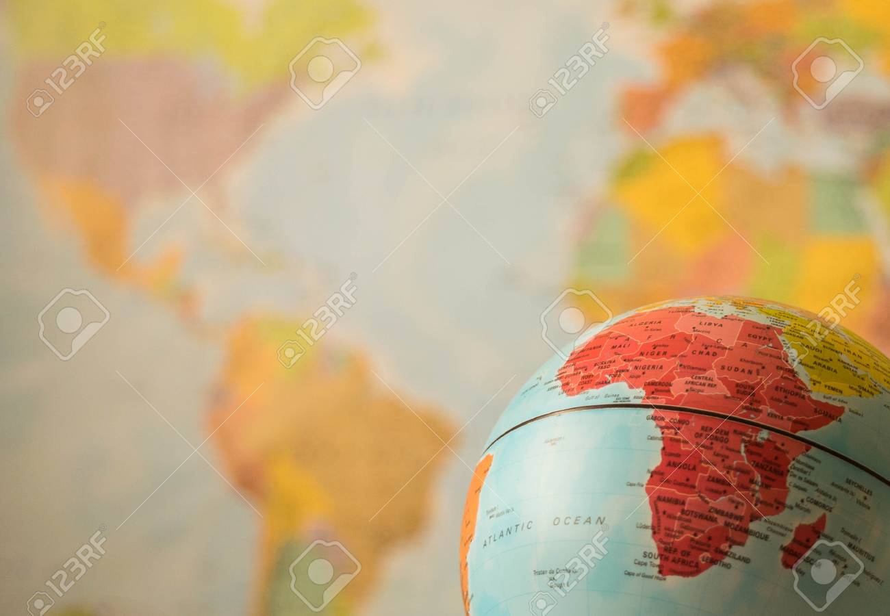 africa map on a globe with the whole world as background stock photo