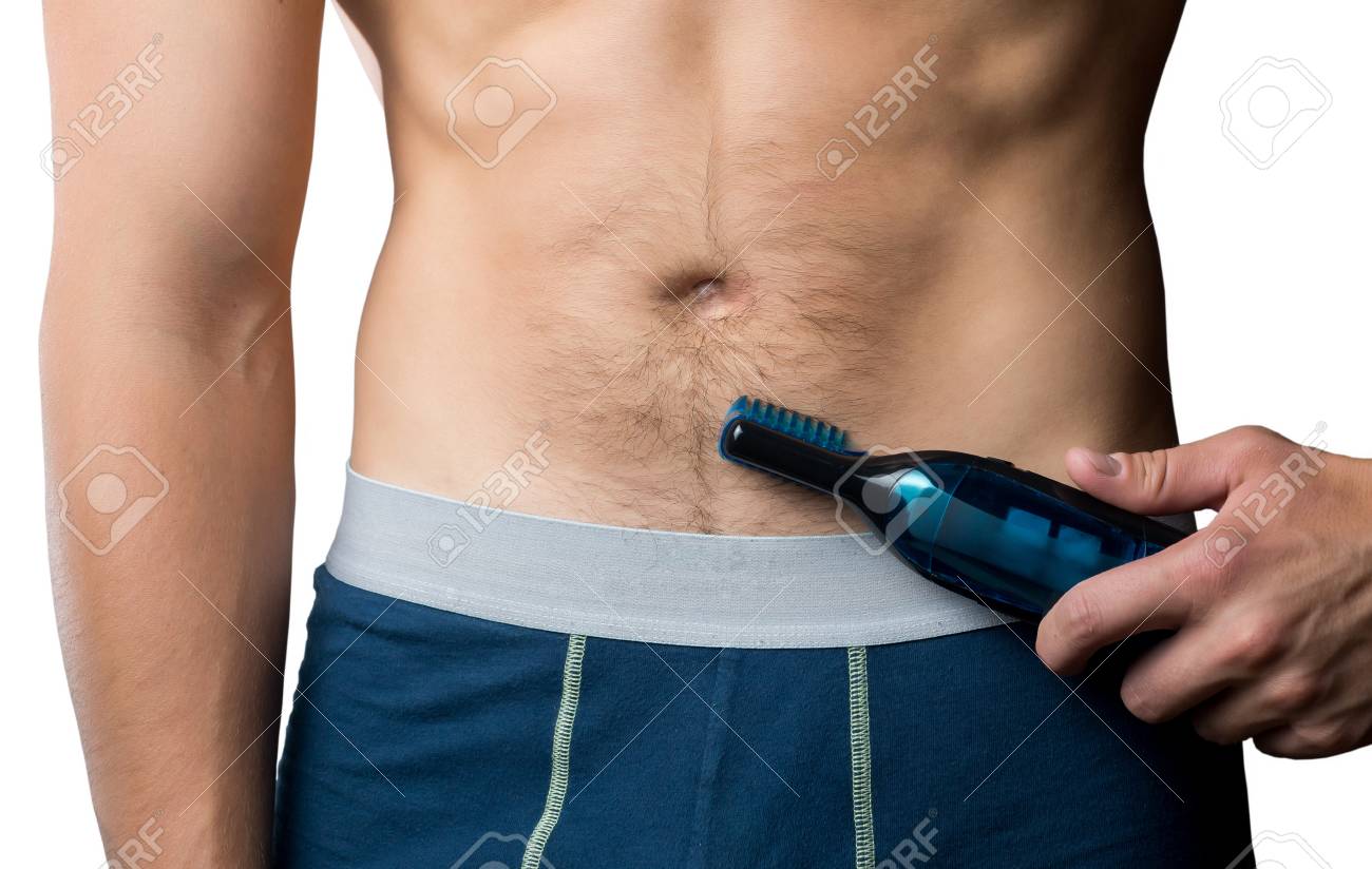 photo of man shaving chest man shaving his stomach stock photo