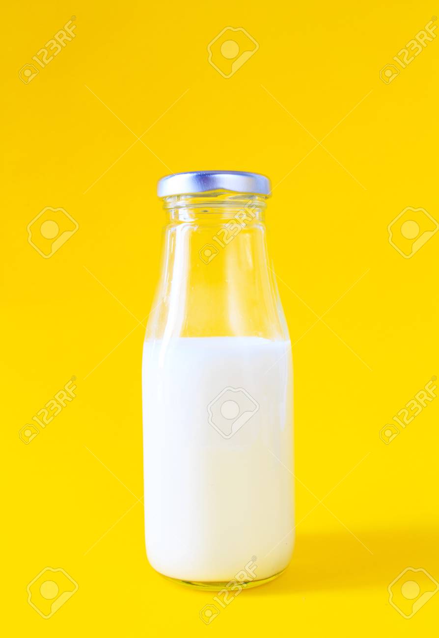 Download Milk Bottle On Yellow Background Stock Photo Picture And Royalty Free Image Image 43887469 Yellowimages Mockups