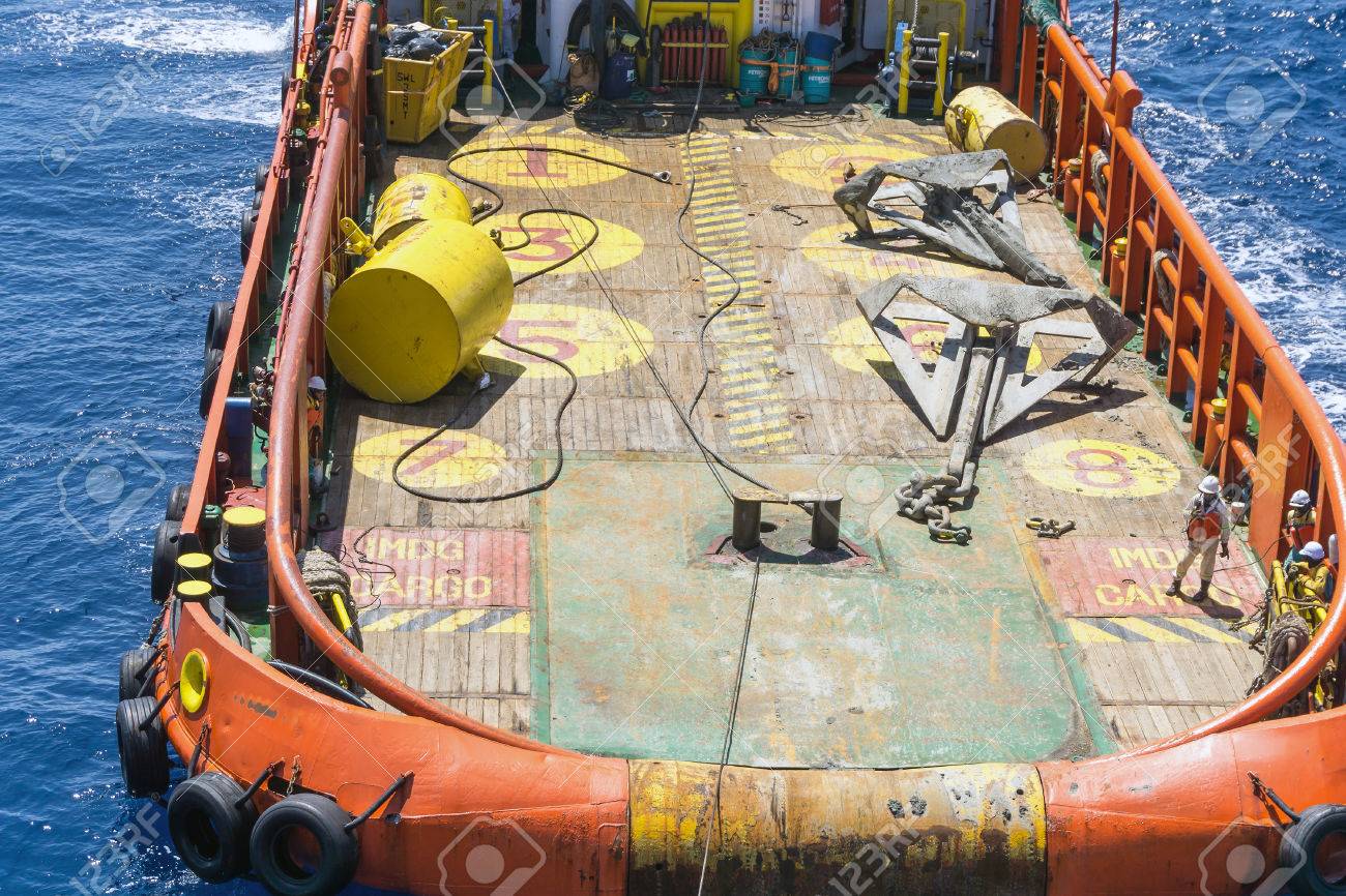 Anchor Handling Tug Deploying Anchors Of Construction Barge At Oilfield Terengganu Malaysia Stock Photo Picture And Royalty Free Image Image 64565494
