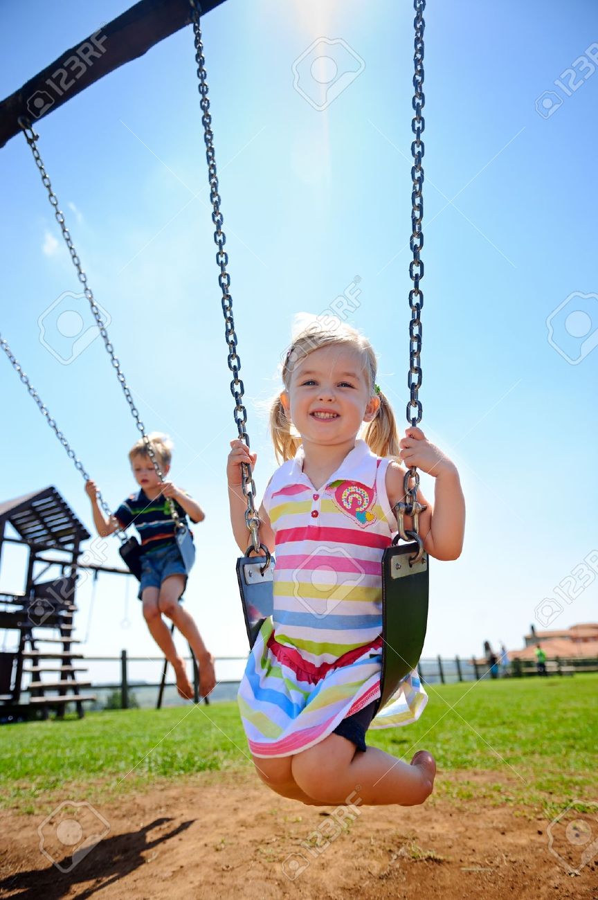 young child on swing
