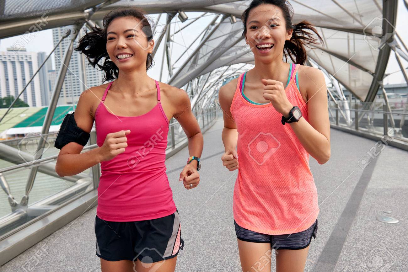 Asian Chinese Happy Women Enjoying A Run Together For Morning Stock Photo Picture And Royalty Free Image Image