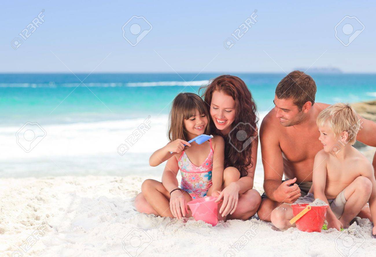 Portrait of a family at the beach - 10214782 Portrait of a family at the beach - 10214782