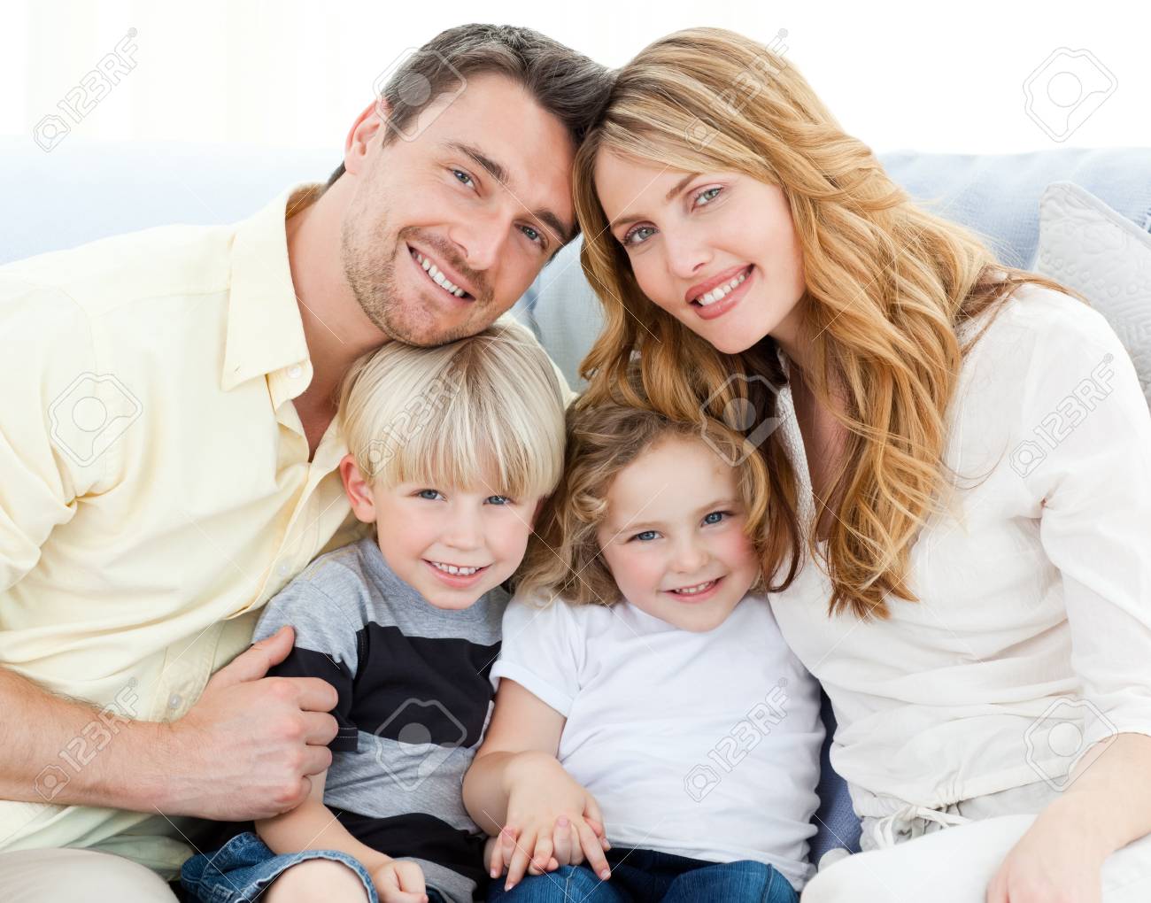 Cute family on the sofa stock photo 10213858