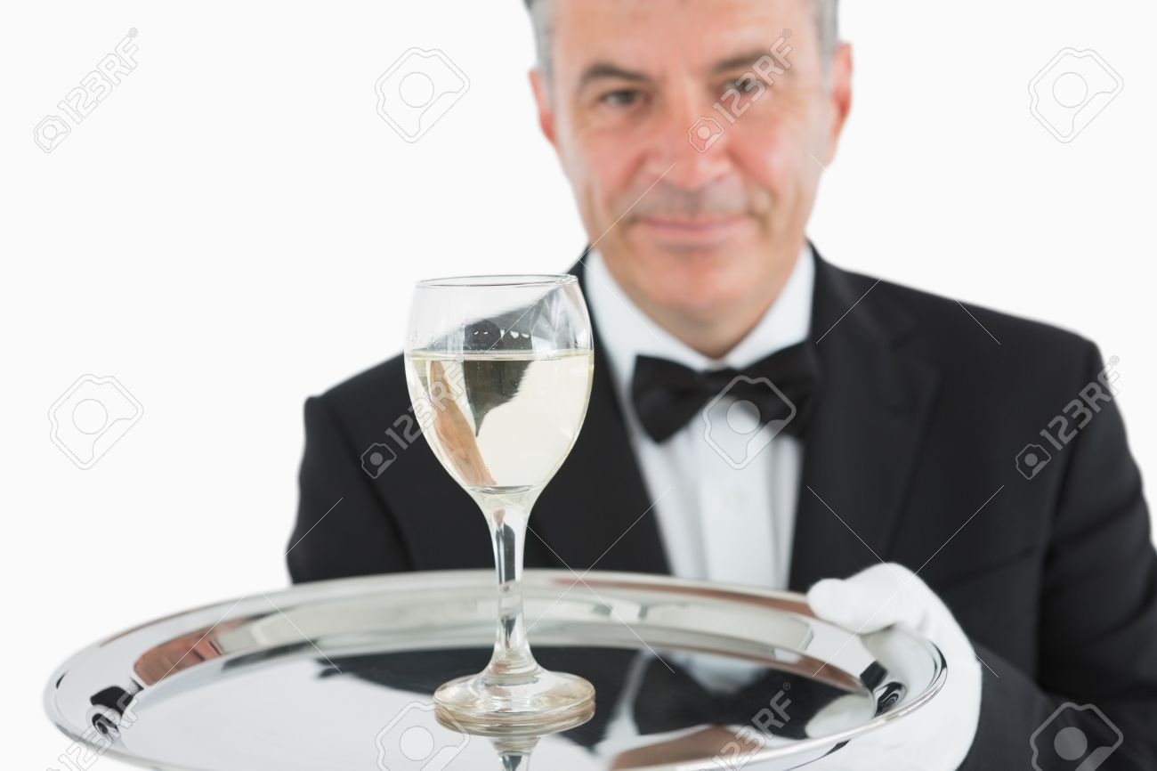 Smiling Man In Suit Serving Glass Of Wine On Silver Platter Stock Photo Picture And Royalty Free Image Image 16074905