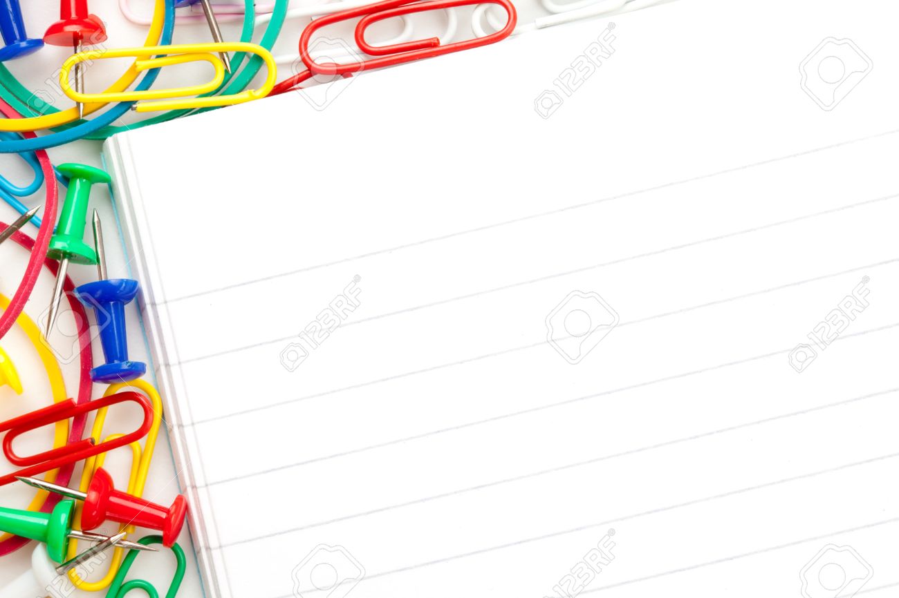 notepad with large group of muti coloured stationery against stock