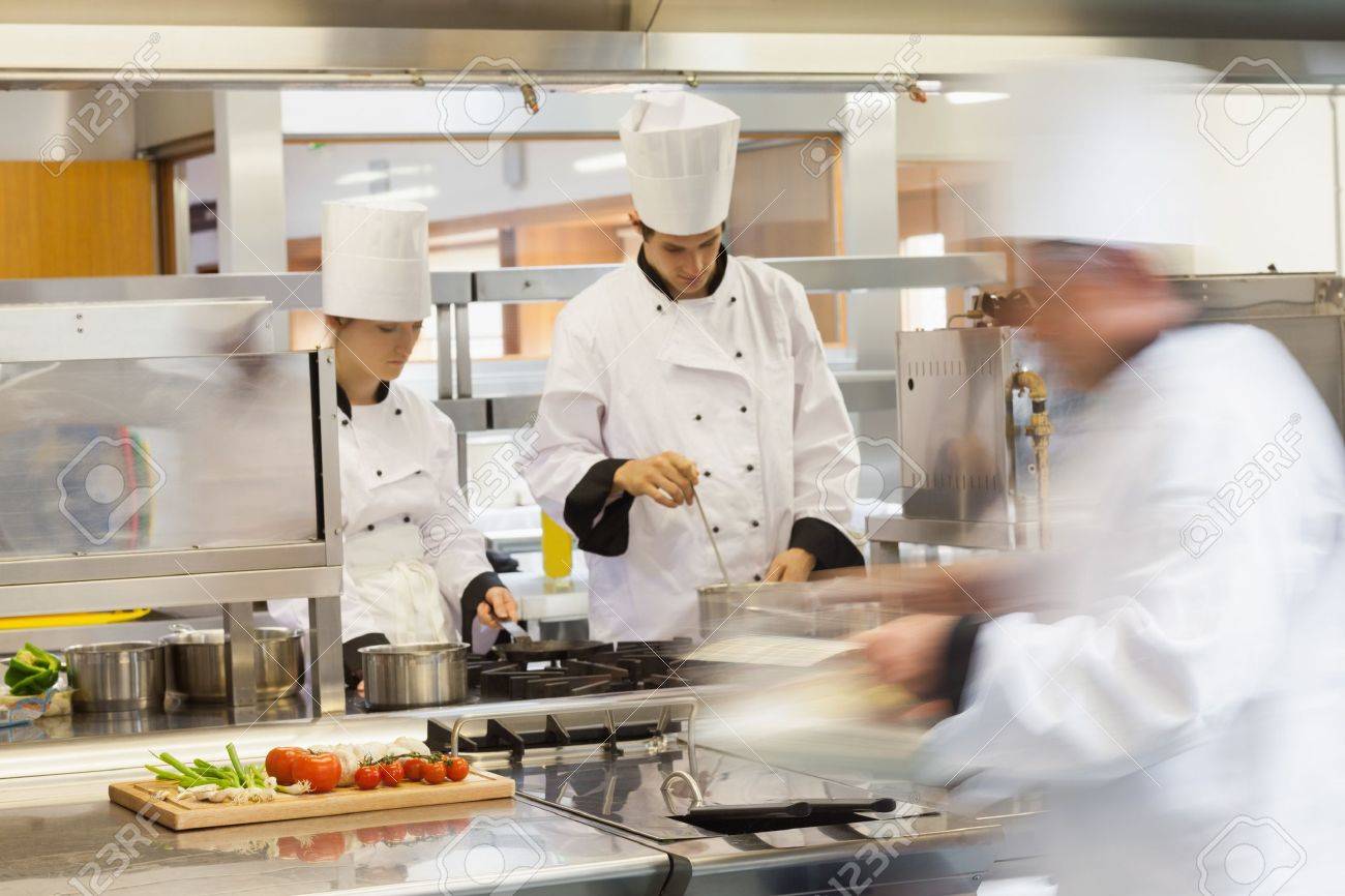 Busy Restaurant Kitchen busy chefs at work in the restaurant kitchen stock photo, picture Busy Restaurant Kitchen busy chefs at work in the restaurant kitchen stock photo, picture