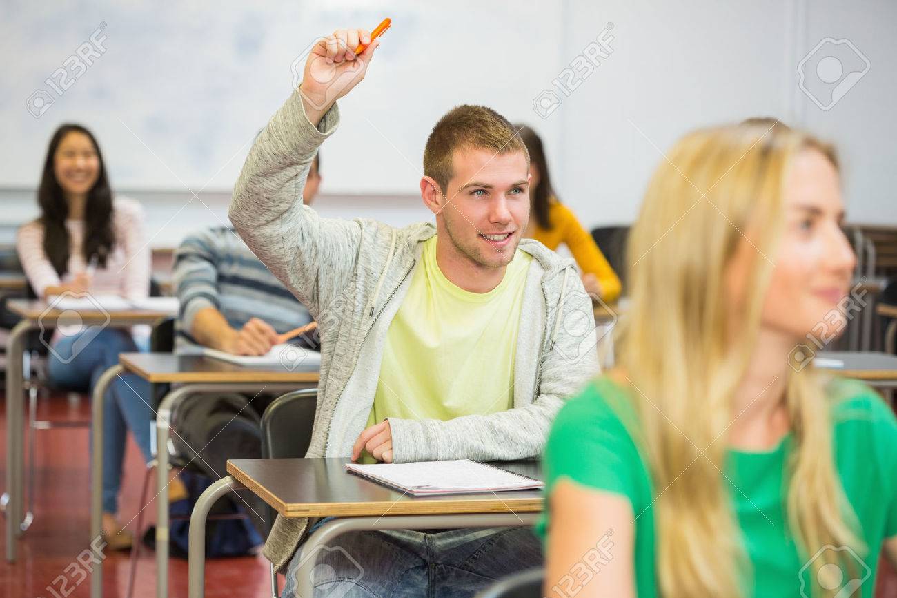 Young Male Student Raising Hand By Others In The College Classroom Stock  Photo, Picture and Royalty Free Image. Image 25786620., image size:1300x866