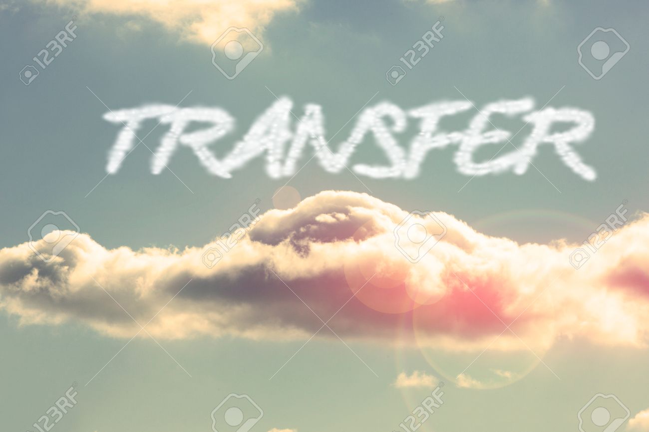 the word transfer against bright blue sky with cloud stock photo word transfer