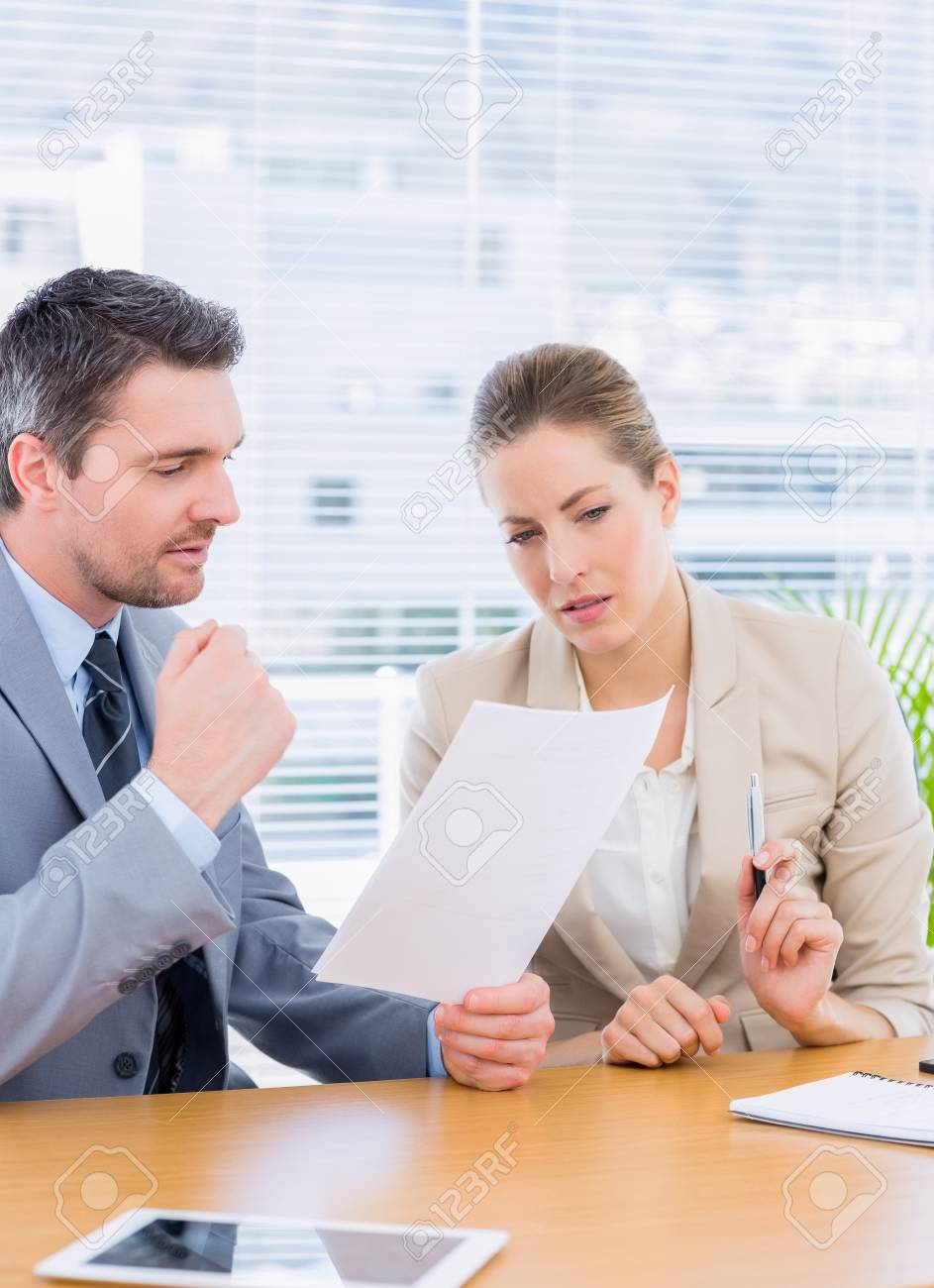 Smartly Dressed Young Man And Woman In A Business Meeting At Stock Photo Picture And Royalty Free Image Image 27080205