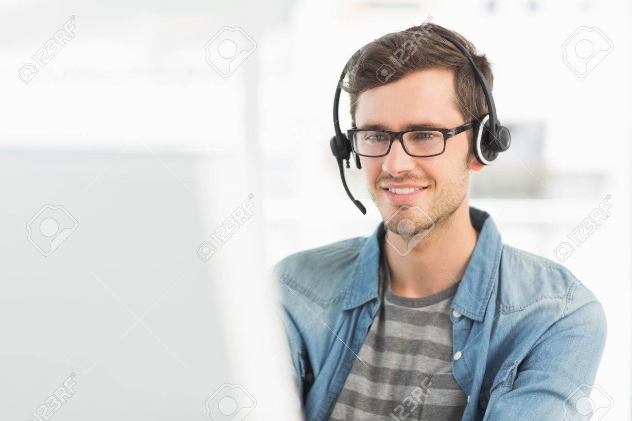 27143078-smiling-casual-young-man-with-h
